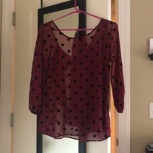 Flowy polka dot top with cute bow on the back